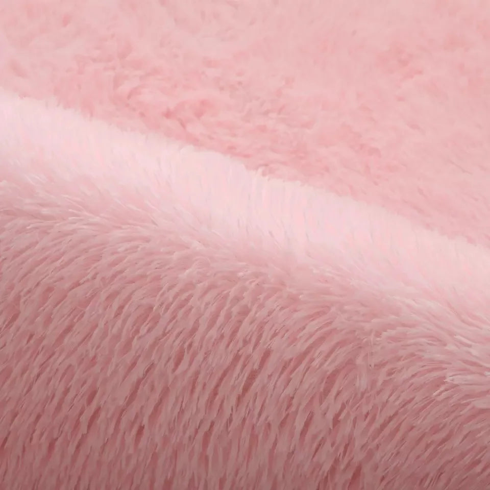 Tapis moelleux rose clair